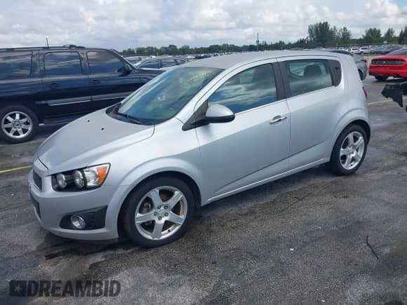 2015 Chevrolet Sonic LTZ with VIN 1G1JE6SB2F4103387, listed as a IAAI auction lot 43400010 with 74,902 mi miles and . Bid and sale history available at DreamBid. Image 2.