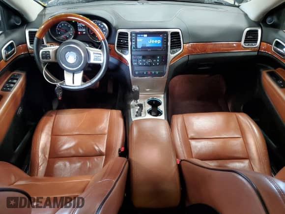 2012 Jeep Grand Cherokee Overland z VIN 1C4RJFCG5CC214050, wystawiony jako Copart lot #66410885 z przebiegiem 137 195 mil mil oraz Szkoda całkowita • Salvage title. Historia ofert i sprzedaży dostępna na DreamBid. Obrazek 8.