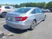 2018 Honda Accord EX-L with VIN 1HGCV3F50JA015873, listed as a IAAI auction lot 43141766 with 152,543 mi miles and . Bid and sale history available at DreamBid. Image 4.