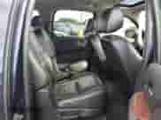 2009 Chevrolet Suburban LTZ z VIN 1GNFK36309R243475, wystawiony jako Copart lot #90379995 z przebiegiem 168 390 mil mil oraz Szkoda całkowita • Salvage title. Historia ofert i sprzedaży dostępna na DreamBid. Obrazek 11.