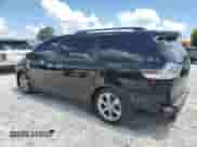 2013 Toyota Sienna SE with VIN 5TDXK3DC2DS283762, listed as a Copart auction lot 64585045 with 212,874 mi miles and Salvage title. Bid and sale history available at DreamBid. Image 2.