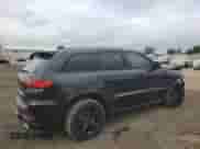 2016 Jeep Grand Cherokee SRT Night с VIN 1C4RJFDJ9GC503741, выставлен на аукционе Copart как лот 71420794 с пробегом 115 673 миль миль и Списание • Salvage title. История ставок и продаж доступна на DreamBid. Изображение 3.