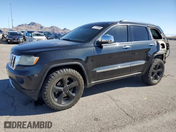 2012 Jeep Grand Cherokee Limited z VIN 1C4RJFBT5CC210966, wystawiony jako Copart lot #71712565 z przebiegiem 139 539 mil mil oraz Szkoda całkowita • Salvage title. Historia ofert i sprzedaży dostępna na DreamBid. Obrazek 1.