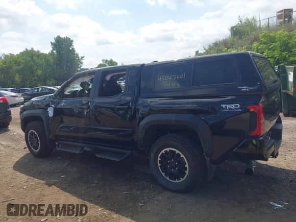 2024 Toyota Tacoma SR5 with VIN 3TMLB5JN4RM054958, listed as a IAAI auction lot 43047601 with 15,429 mi miles and . Bid and sale history available at DreamBid. Image 14.