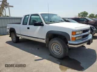 1999 Chevrolet Silverado 2500 с VIN 1GCGK29R2XF094752, выставлен на аукционе Copart как лот 66548124 с пробегом 164 155 миль миль и Списание • Salvage title. История ставок и продаж доступна на DreamBid. Изображение 4.