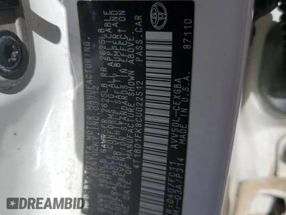 2012 Toyota Camry XLE z VIN 4T1BD1FK8CU022512, wystawiony jako Copart lot #82413865 z przebiegiem Nie podano mil oraz Szkoda całkowita • Salvage title. Historia ofert i sprzedaży dostępna na DreamBid. Obrazek 12.