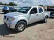 2017 Nissan Frontier SV with VIN 1N6AD0ER7HN701467, listed as a Copart auction lot 84197825 with 195,672 mi miles and Salvage title. Bid and sale history available at DreamBid. Image 1.