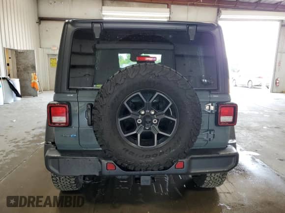 2024 Jeep Wrangler Sport S с VIN 1C4RJXN61RW218727, выставлен на аукционе Copart как лот 67114255 с пробегом 13 327 миль миль и Списание • Salvage title. История ставок и продаж доступна на DreamBid. Изображение 6.