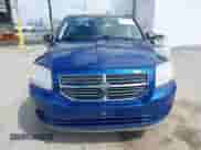 2009 Dodge Caliber SXT with VIN 1B3HB48C89D125855, listed as a IAAI auction lot 41930478 with 66,403 mi miles and . Bid and sale history available at DreamBid. Image 6.