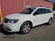 2015 Dodge Journey SE with VIN 3C4PDCAB3FT602617, listed as a Copart auction lot 81873125 with 243,830 mi miles and Clean title. Bid and sale history available at DreamBid. Image 1.