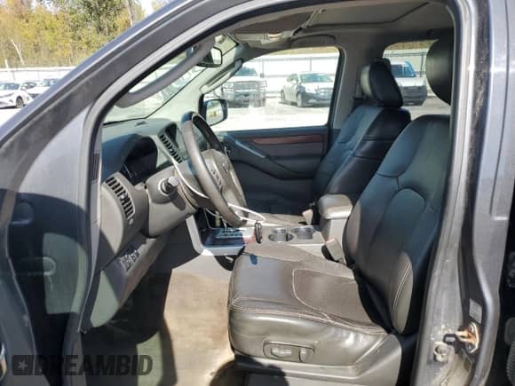 2012 Nissan Pathfinder SV z VIN 5N1AR1NB8CC619549, wystawiony jako Copart lot #85133025 z przebiegiem 128 019 mil mil oraz Szkoda całkowita • Salvage title. Historia ofert i sprzedaży dostępna na DreamBid. Obrazek 7.