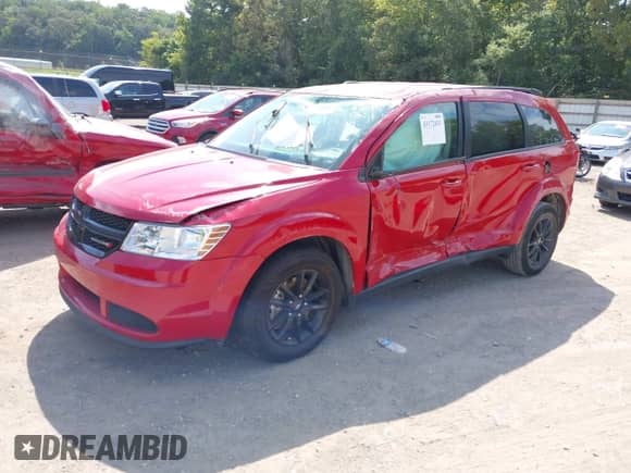 2020 Dodge Journey SE Value with VIN 3C4PDCAB6LT272080, listed as a IAAI auction lot 43172431 with 97,056 mi miles and . Bid and sale history available at DreamBid. Image 2.