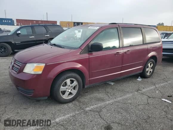 2009 Dodge Grand Caravan SE z VIN 2D8HN44EX9R519031, wystawiony jako Copart lot #90300025 z przebiegiem 159 823 mil mil oraz Czysty tytuł • Clean title. Historia ofert i sprzedaży dostępna na DreamBid. Obrazek 1.