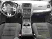 2015 Dodge Grand Caravan SXT with VIN 2C4RDGCG4FR605473, listed as a Copart auction lot 52689925 with 179,966 mi miles and Salvage title. Bid and sale history available at DreamBid. Image 8.