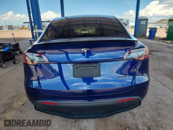 2022 Tesla Model Y Performance with VIN 7SAYGDEFXNF542785, listed as a Copart auction lot 81153785 with 53,108 mi miles and Salvage title. Bid and sale history available at DreamBid. Image 6.