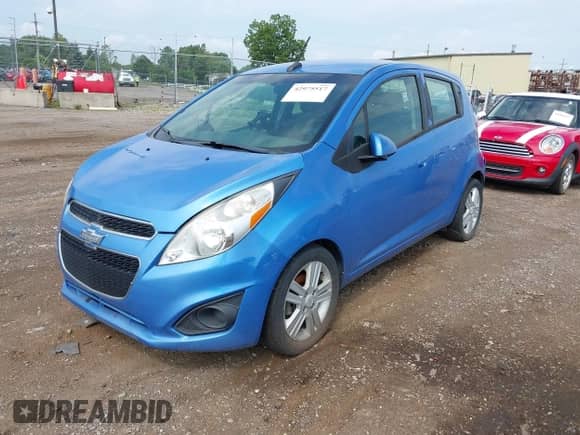 2014 Chevrolet Spark LS z VIN KL8CA6S95EC529693, wystawiony jako IAAI lot #42975517 z przebiegiem 51 255 mil mil oraz . Historia ofert i sprzedaży dostępna na DreamBid. Obrazek 2.