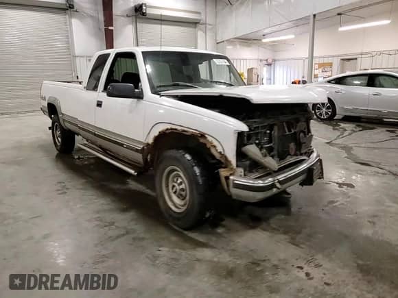 1998 Chevrolet Silverado 2500 with VIN 1GCGK29J0WE209704, listed as a Copart auction lot 72757704 with 253,031 mi miles and Salvage title. Bid and sale history available at DreamBid. Image 10.