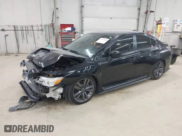 2017 Subaru WRX Premium with VIN JF1VA1E66H9810090, listed as a IAAI auction lot 43375896 with 112,033 mi miles and . Bid and sale history available at DreamBid. Image 2.