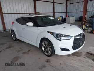2013 Hyundai Veloster w/Black Int with VIN KMHTC6AD3DU171621, listed as a IAAI auction lot 42902812 with 135,498 mi miles and . Bid and sale history available at DreamBid. Image 1.