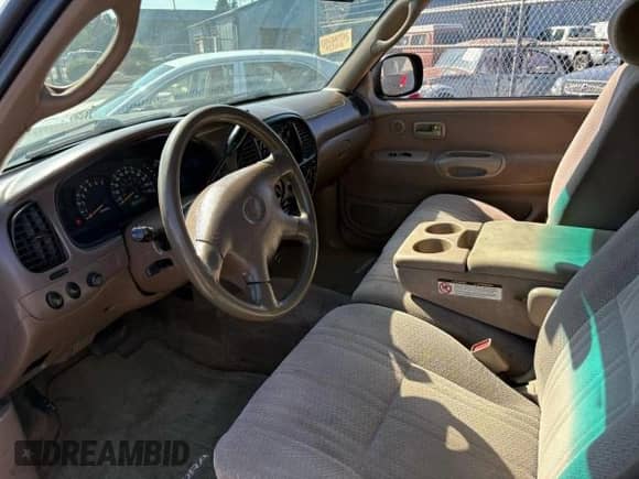 2001 Toyota Tundra SR5 с VIN 5TBBT44181S160189, выставлен на аукционе Copart как лот 87310775 с пробегом 350 485 миль миль и Списание • Salvage title. История ставок и продаж доступна на DreamBid. Изображение 9.