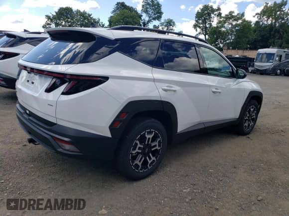 2025 Hyundai Tucson SEL with VIN 5NMJFCDE1SH497492, listed as a Copart auction lot 70523465 with 18 mi miles and Salvage title. Bid and sale history available at DreamBid. Image 3.