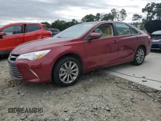 2016 Toyota Camry XLE with VIN 4T1BF1FKXGU605261, listed as a Copart auction lot 85713515 with 196,248 mi miles and Salvage title. Bid and sale history available at DreamBid. Image 1.