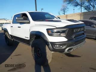 2023 Ram 1500 TRX z VIN 1C6SRFU95PN585088, wystawiony jako IAAI lot #41304552 z przebiegiem 21 031 mil mil oraz . Historia ofert i sprzedaży dostępna na DreamBid. Obrazek 1.