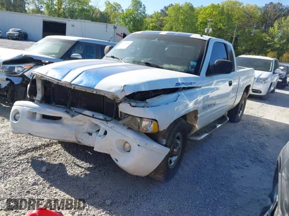 1999 Dodge 2500 with VIN 1B7KC23W1XJ616757, listed as a IAAI auction lot 42026654 with 201,445 mi miles and . Bid and sale history available at DreamBid. Image 2.