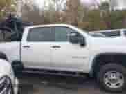 2023 Chevrolet Silverado 2500HD Work Truck z VIN 1GC1YLE73PF124954, wystawiony jako IAAI lot #43498957 z przebiegiem 100 752 mil mil oraz . Historia ofert i sprzedaży dostępna na DreamBid. Obrazek 13.