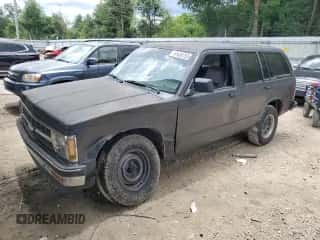 1991 Chevrolet Blazer z VIN 1GNCS13Z7M2179940, wystawiony jako Copart lot #61434755 z przebiegiem Nie podano mil oraz Szkoda całkowita • Salvage title. Historia ofert i sprzedaży dostępna na DreamBid. Obrazek 1.