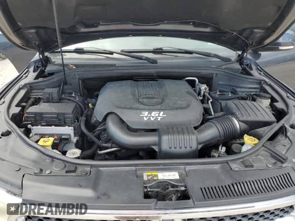 2013 Dodge Durango Crew with VIN 1C4RDHDG0DC666569, listed as a Copart auction lot 59568055 with 136,418 mi miles and Salvage title. Bid and sale history available at DreamBid. Image 12.