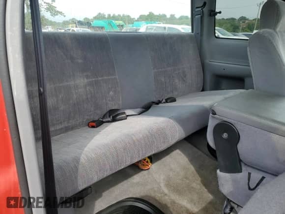 1997 Dodge 1500 z VIN 3B7HF13ZXVM599298, wystawiony jako Copart lot #74320614 z przebiegiem Nie podano mil oraz Czysty tytuł • Clean title. Historia ofert i sprzedaży dostępna na DreamBid. Obrazek 10.