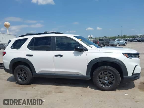 2023 Honda Pilot TrailSport with VIN 5FNYG1H67PB043095, listed as a IAAI auction lot 42045974 with 46,333 mi miles and . Bid and sale history available at DreamBid. Image 13.