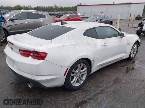 2021 Chevrolet Camaro 1LT с VIN 1G1FB1RX4M0142120, выставлен на аукционе IAAI как лот 41394658 с пробегом 25 477 миль миль и . История ставок и продаж доступна на DreamBid. Изображение 4.