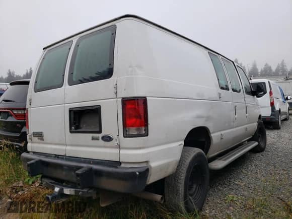 2013 Ford Econoline Cargo Commercial с VIN 1FTNE2EWXDDA96461, выставлен на аукционе Copart как лот 71060615 с пробегом Не указан миль и Списание • Salvage title. История ставок и продаж доступна на DreamBid. Изображение 3.