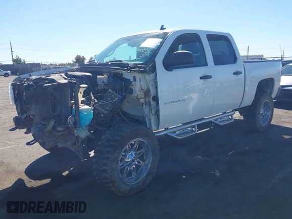 2013 Chevrolet Silverado 1500 LT z VIN 3GCPKSEA4DG107799, wystawiony jako IAAI lot #43397786 z przebiegiem 169 282 mil mil oraz . Historia ofert i sprzedaży dostępna na DreamBid. Obrazek 2.