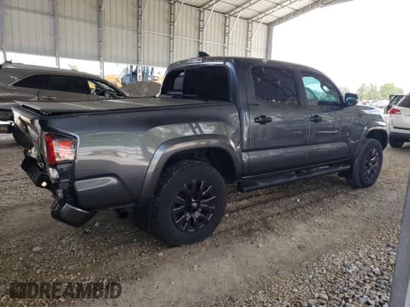 2022 Toyota Tacoma Limited with VIN 3TMGZ5AN0NM513152, listed as a Copart auction lot 54418825 with 23,439 mi miles and Salvage title. Bid and sale history available at DreamBid. Image 3.