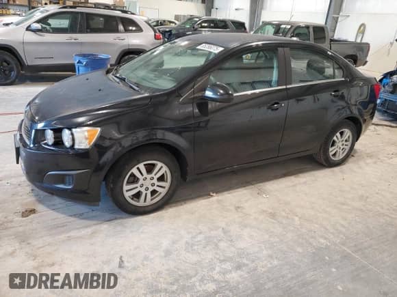 2013 Chevrolet Sonic LT с VIN 1G1JC5SH8D4205200, выставлен на аукционе Copart как лот 85286075 с пробегом 56 951 миль миль и Списание • Salvage title. История ставок и продаж доступна на DreamBid. Изображение 1.