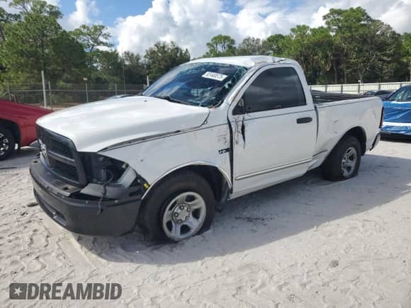 2012 Ram 1500 Tradesman with VIN 3C6JD6AT0CG124510, listed as a Copart auction lot 82440575 with 146,407 mi miles and Salvage title. Bid and sale history available at DreamBid. Image 1.