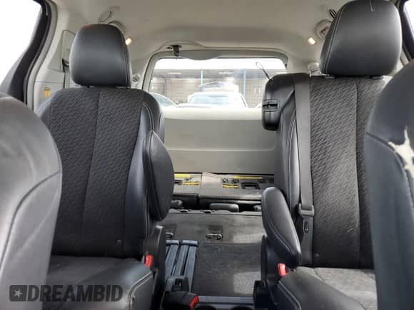 2014 Toyota Sienna SE with VIN 5TDXK3DC0ES412437, listed as a Copart auction lot 70558525 with 145,488 mi miles and Salvage title. Bid and sale history available at DreamBid. Image 10.