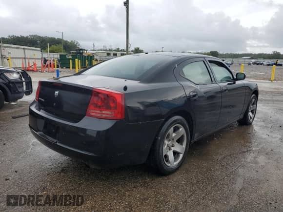 2007 Dodge Charger Police z VIN 2B3LA43H07H690679, wystawiony jako Copart lot #68666545 z przebiegiem 219 170 mil mil oraz Czysty tytuł • Clean title. Historia ofert i sprzedaży dostępna na DreamBid. Obrazek 3.