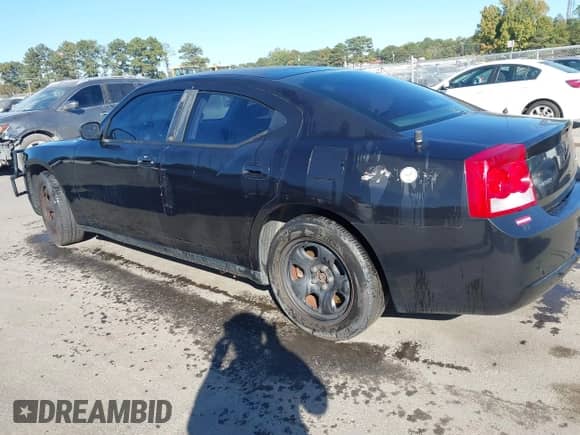 2010 Dodge Charger Police with VIN 2B3AA4CV1AH304081, listed as a IAAI auction lot 43432595 with 149,436 mi miles and . Bid and sale history available at DreamBid. Image 3.