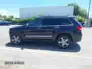 2012 Jeep Grand Cherokee Overland with VIN 1C4RJECG6CC354845, listed as a IAAI auction lot 42345103 with 106,691 mi miles and . Bid and sale history available at DreamBid. Image 14.