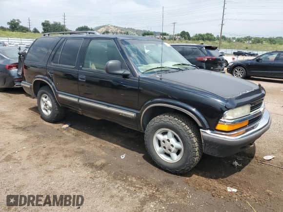 1998 Chevrolet Blazer LS с VIN 1GNDT13W2W2225782, выставлен на аукционе Copart как лот 65555915 с пробегом 159 005 миль миль и Списание • Salvage title. История ставок и продаж доступна на DreamBid. Изображение 4.