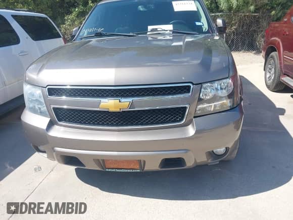 2012 Chevrolet Tahoe LT with VIN 1GNSCBE04CR161804, listed as a IAAI auction lot 43311334 with 242,513 mi miles and . Bid and sale history available at DreamBid. Image 6.