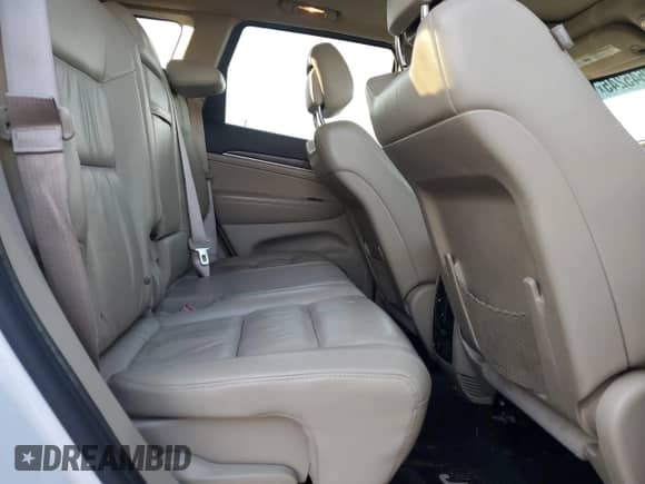 2014 Jeep Grand Cherokee Limited z VIN 1C4RJFBG8EC276059, wystawiony jako Copart lot #82645245 z przebiegiem 131 102 mil mil oraz Czysty tytuł • Clean title. Historia ofert i sprzedaży dostępna na DreamBid. Obrazek 11.