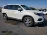 2018 Honda Pilot EX-L with VIN 5FNYF5H6XJB031766, listed as a Copart auction lot 64246195 with 82,173 mi miles and Salvage title. Bid and sale history available at DreamBid. Image 4.