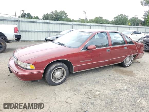 1992 Chevrolet Caprice z VIN 1G1BN53EXNR152894, wystawiony jako Copart lot #57489535 z przebiegiem 167 778 mil mil oraz Szkoda całkowita • Salvage title. Historia ofert i sprzedaży dostępna na DreamBid. Obrazek 1.