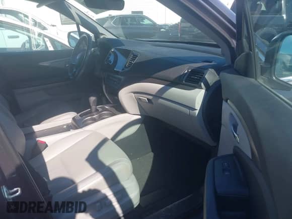 2020 Honda Pilot EX-L with VIN 5FNYF5H56LB003196, listed as a IAAI auction lot 41636258 with 76,868 mi miles and . Bid and sale history available at DreamBid. Image 5.