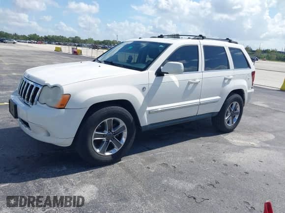 2008 Jeep Grand Cherokee Limited z VIN 1J8HR58298C187009, wystawiony jako IAAI lot #42868827 z przebiegiem 197 227 mil mil oraz . Historia ofert i sprzedaży dostępna na DreamBid. Obrazek 2.